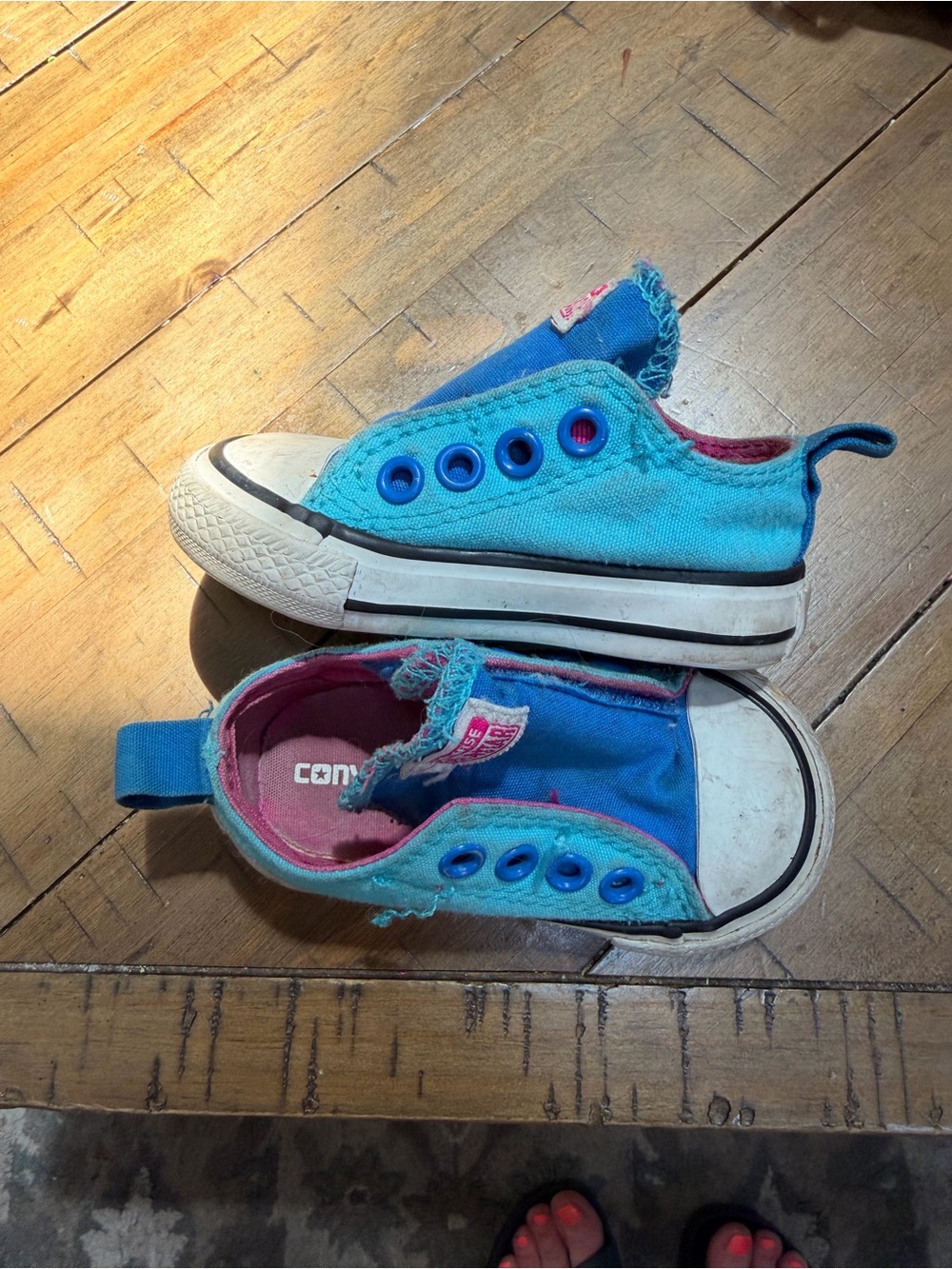Converse Kids Slip-On Sneakers in Blue with Pink Accents